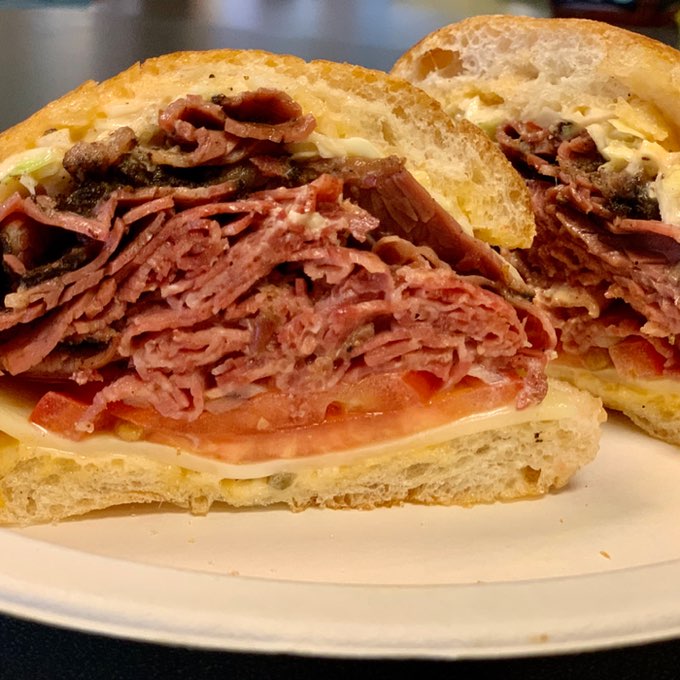 Pastrami sandwich piled high on rye